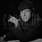 11-12-1985 Leonard Cohen in Rotterdam, The Netherlands. December 11, 1985.

[keywords]Posed, Headshot, Eye contact, Black & White image, Smoking[/keywords]